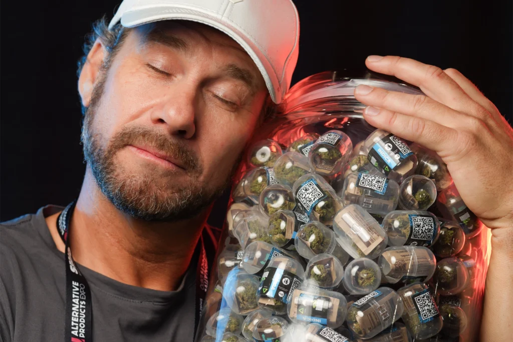 Man holding a jar of Buddah Society Buddah Grams